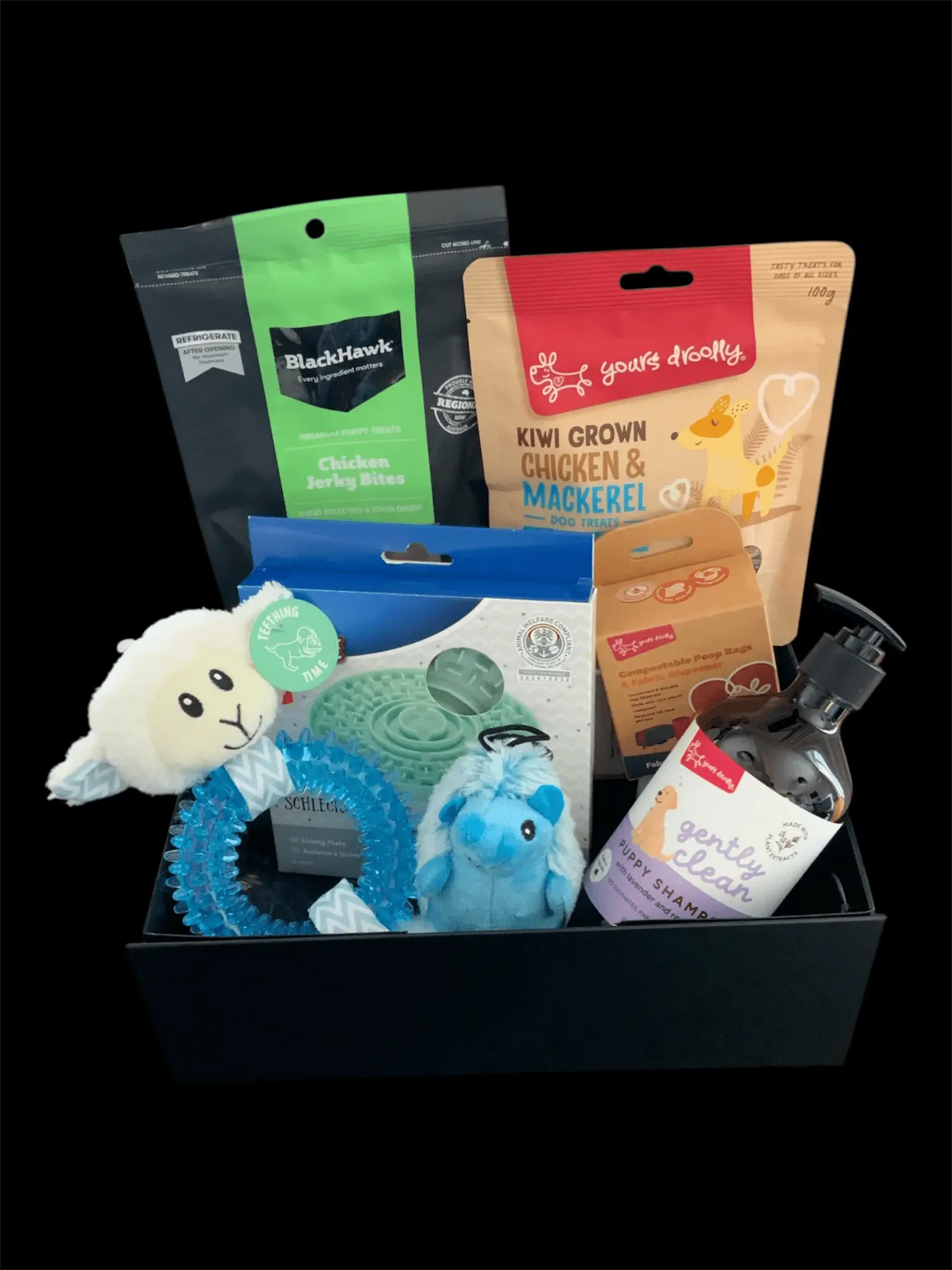 Dog gift box with treats, toys, puppy shampoo, and accessories from Pawsome Pooch Parcels