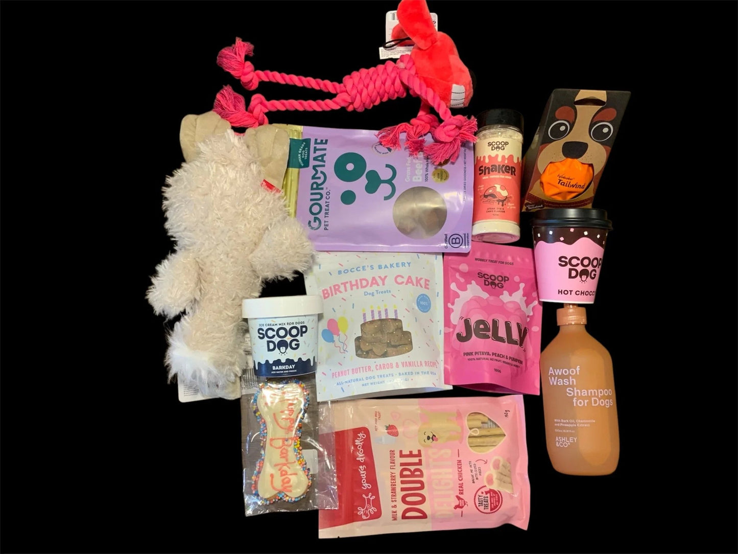 Premium dog gift box with toys, treats, shampoo, and snacks from Pawsome Pooch Parcels.