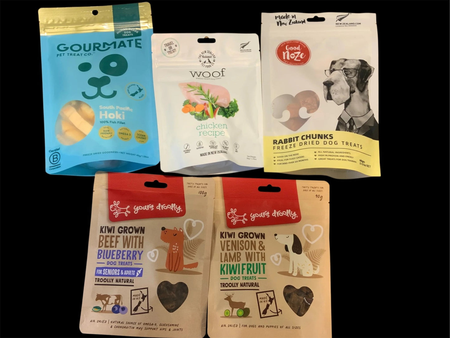 Assorted premium New Zealand dog treats in colorful packaging from Pawsome Pooch Parcels
