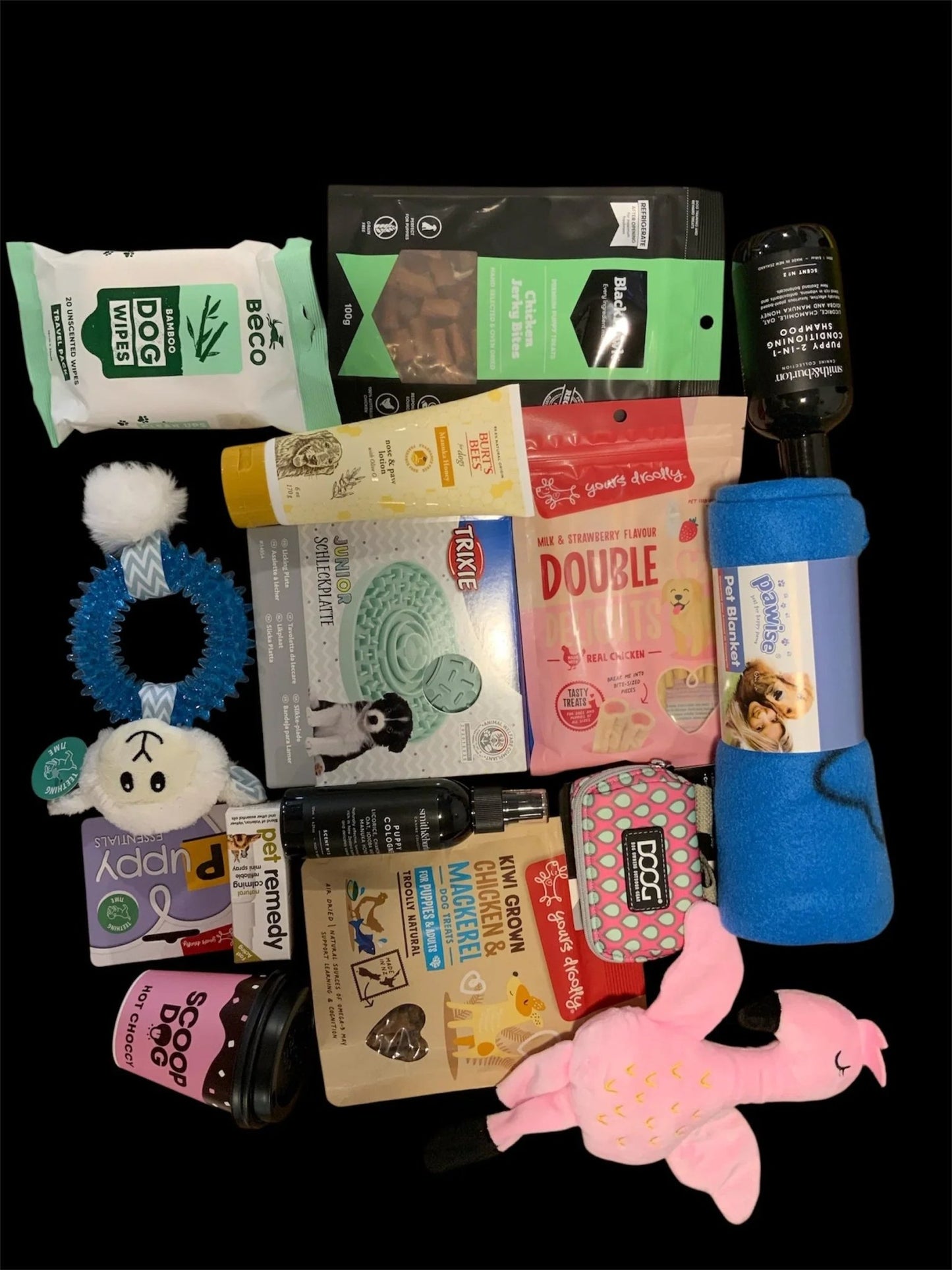 Premium dog gift box items with toys, treats, and accessories from Pawsome Pooch Parcels