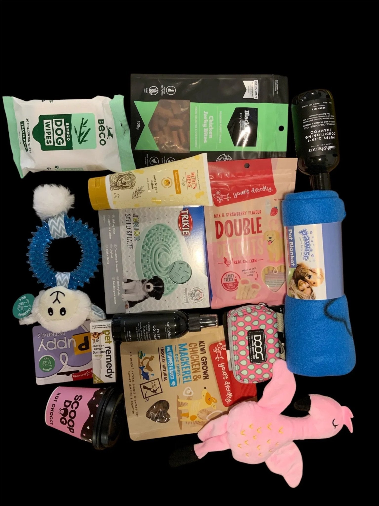 Premium dog gift box items with toys, treats, and accessories from Pawsome Pooch Parcels