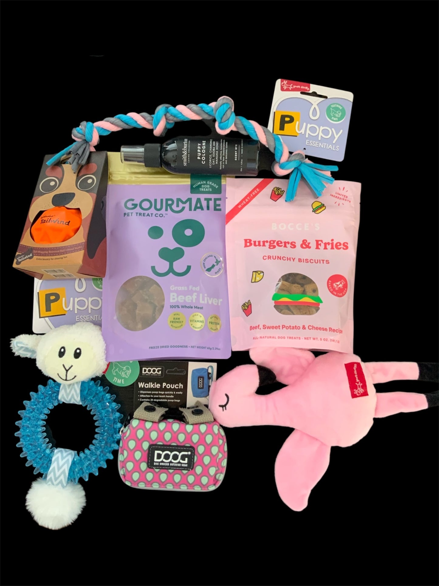 Dog gift box with natural treats, rope toy, plush toys and grooming spray